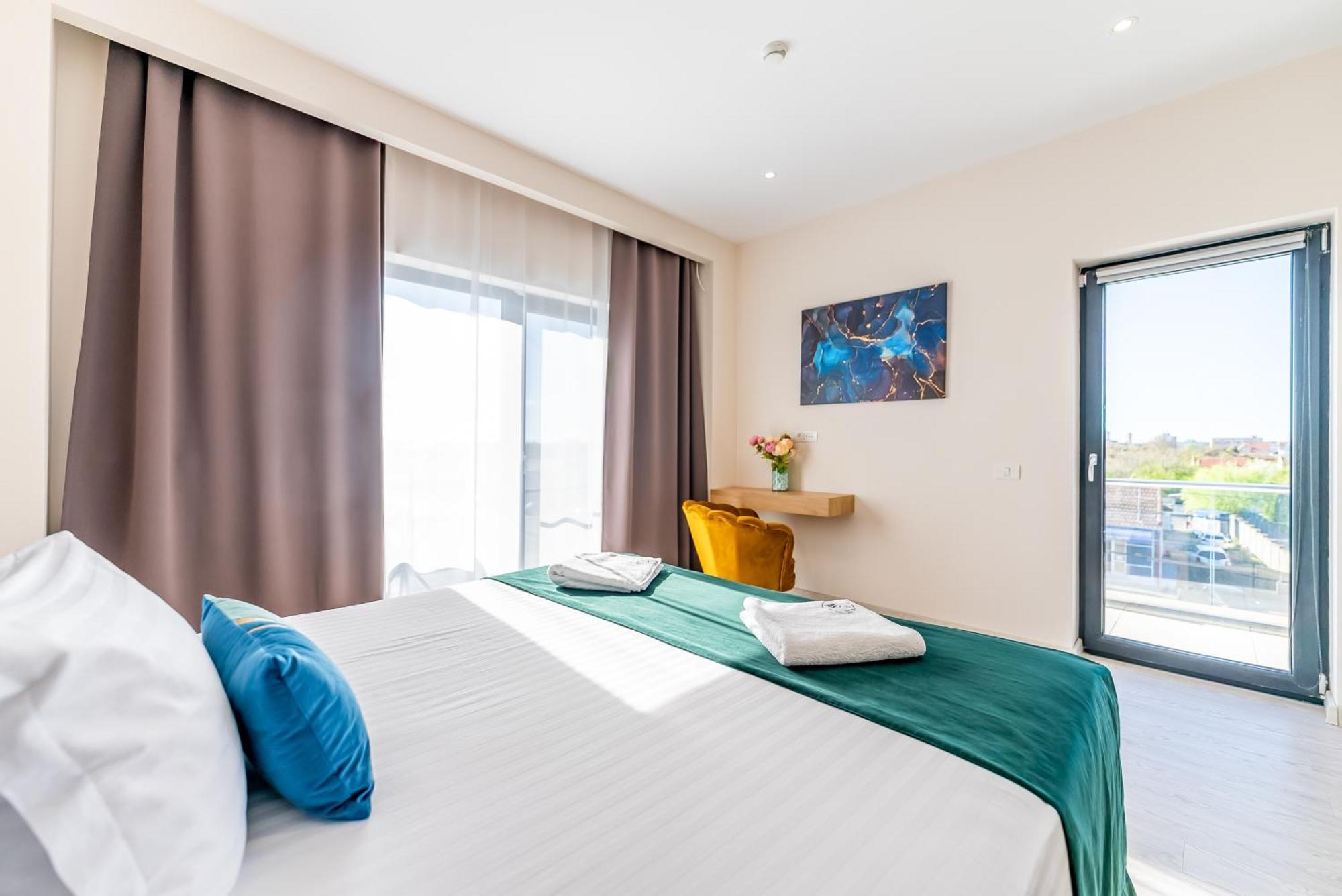 M City Aparthotel Arad Pokoj fotografie