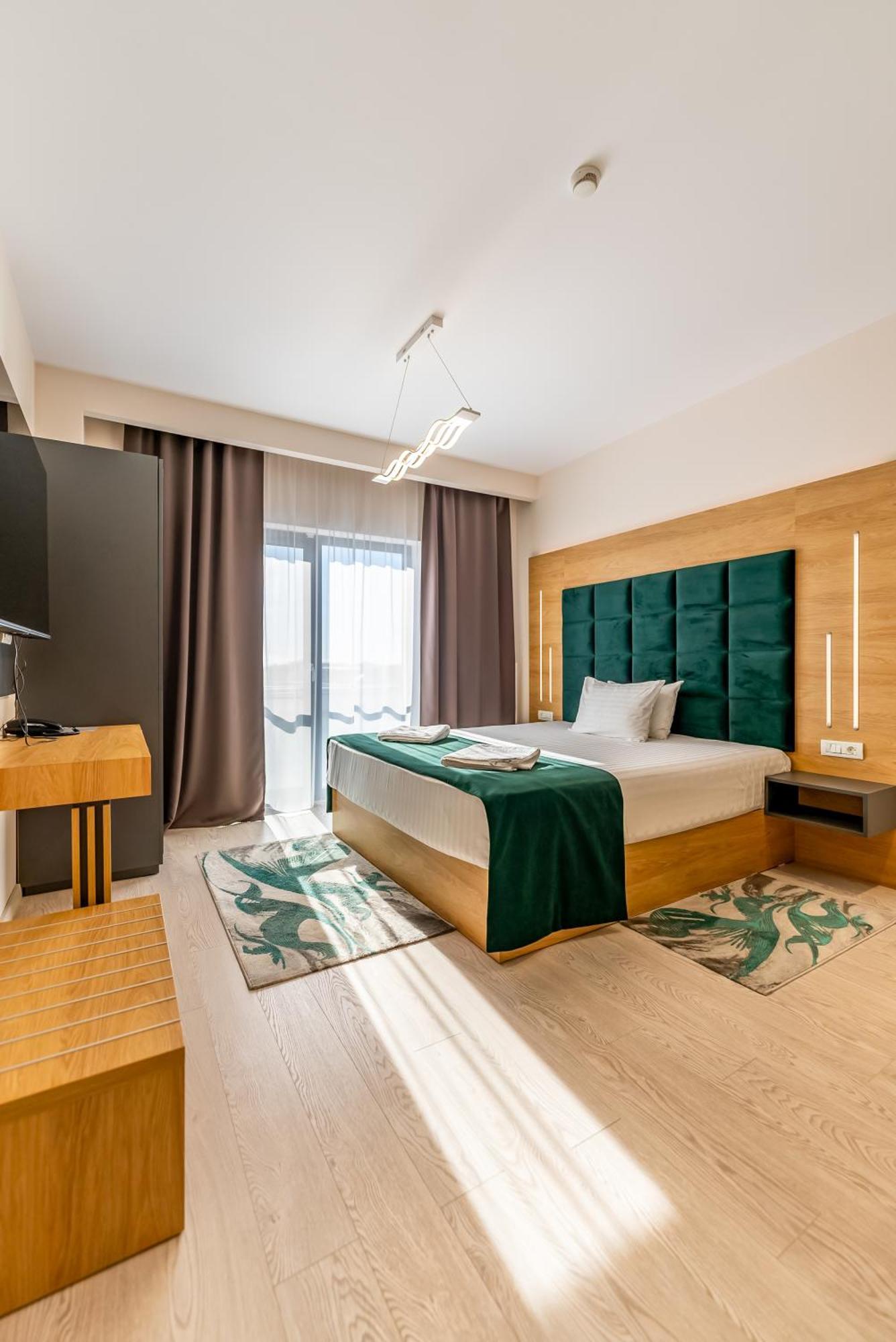 M City Aparthotel Arad Pokoj fotografie